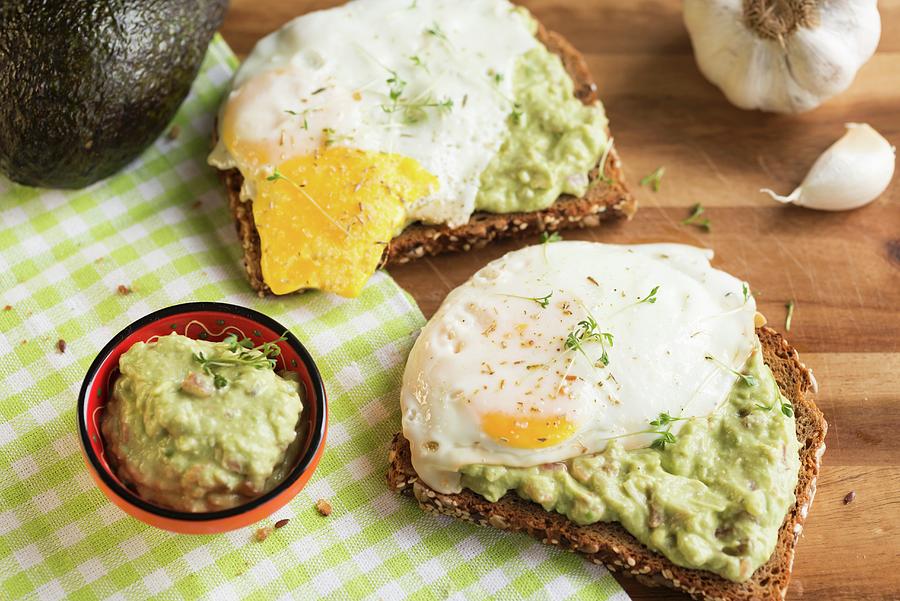 Multi-grain Bread With Guacamole And Fried Egg Photograph by Nadja ...