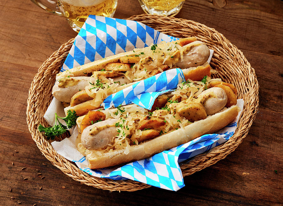 Munich-style Hot Dogs With Sauerkraut Slaw And Fried Potatoes Photograph by Stefan Schulte-ladbeck