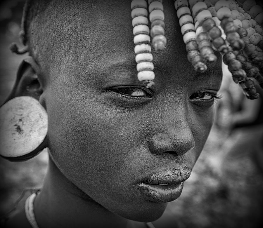 Mursi Girl (omo Valley-ethiopia) Photograph by Joxe Inazio Kuesta Garmendia