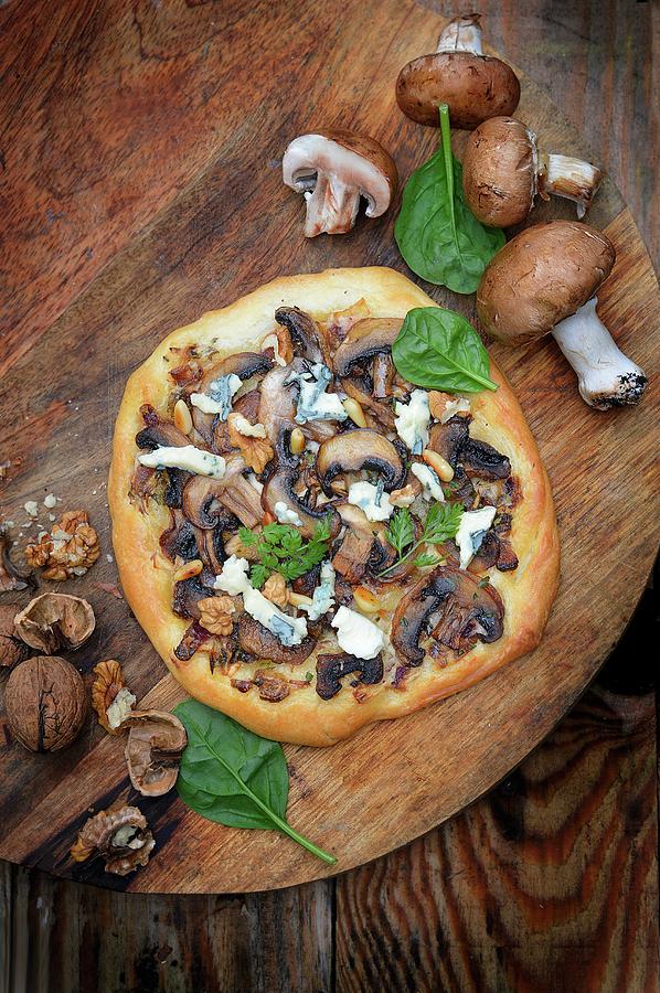 Mushroom, Blue Cheese And Walnut Pizzas Photograph by Keroudan