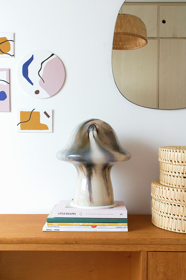 Mushroom-shaped, Marbled Table Lamp On Stacked Books Photograph by Marij Hessel