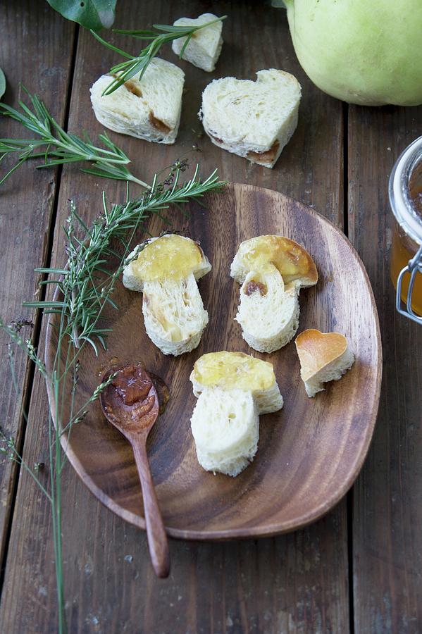 Mushroom Shapes Cut Out Of Yeast Dough And Covered In Quince Jam Photograph by Martina Schindler