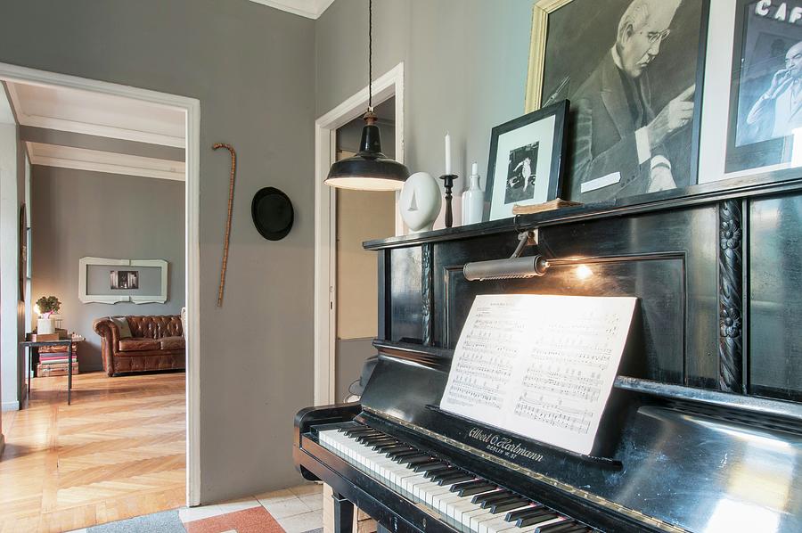 Music Book On Piano In Grey-painted Music Room Photograph by Andrea Cuscuna