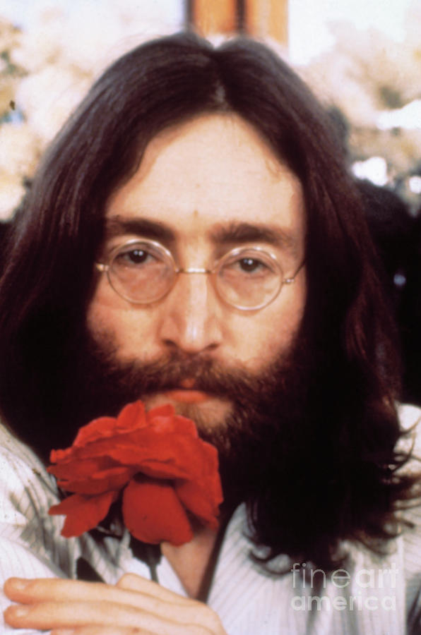 Musician John Lennon With Rose Photograph by Bettmann