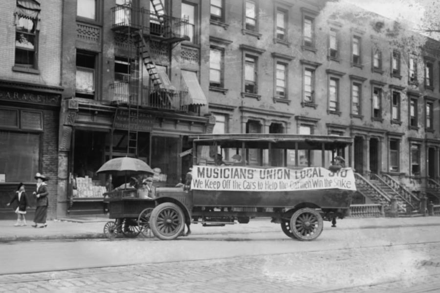 Musicians Union Truck parked by Hot Dog Vendor Cart sports large banner supporting the Transit Strike Painting by Musicians Union Truck parked by Hot Dog Vendor Cart sports large banner supporting the Transit Strike Painting by