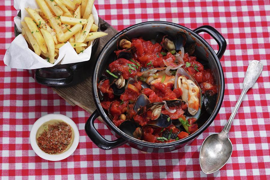 Mussel Stew With Chips On A Checked Tablecloth Photograph by Frank ...