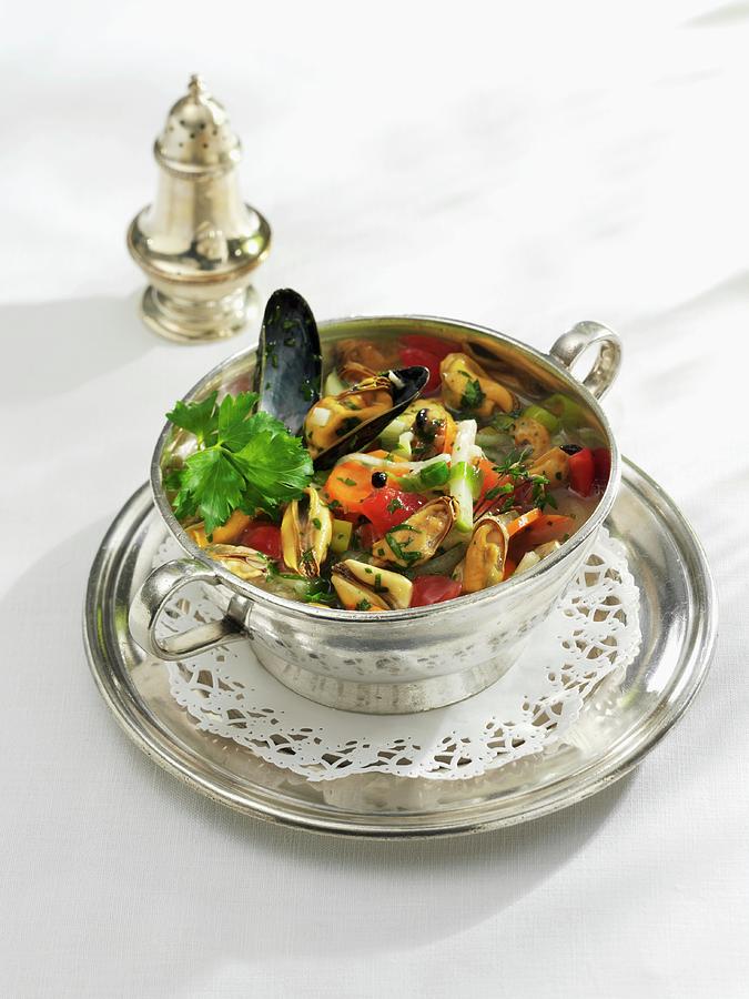 Mussel Stew With Tomatoes And Kohlrabi Photograph by Karl Newedel