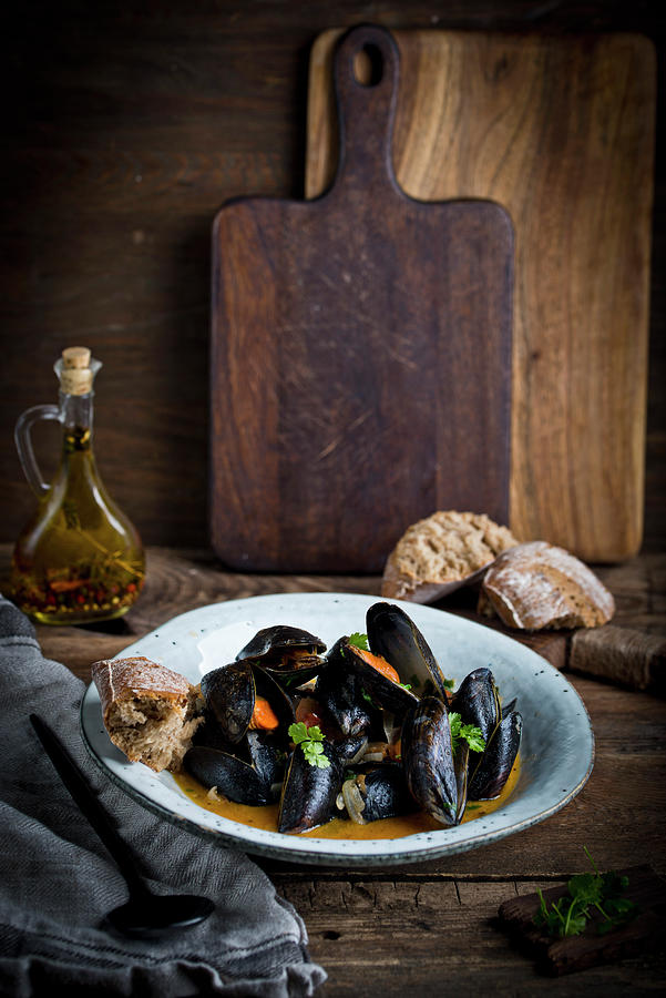 Mussels In Sauce With Bread Photograph by Dorota Indycka