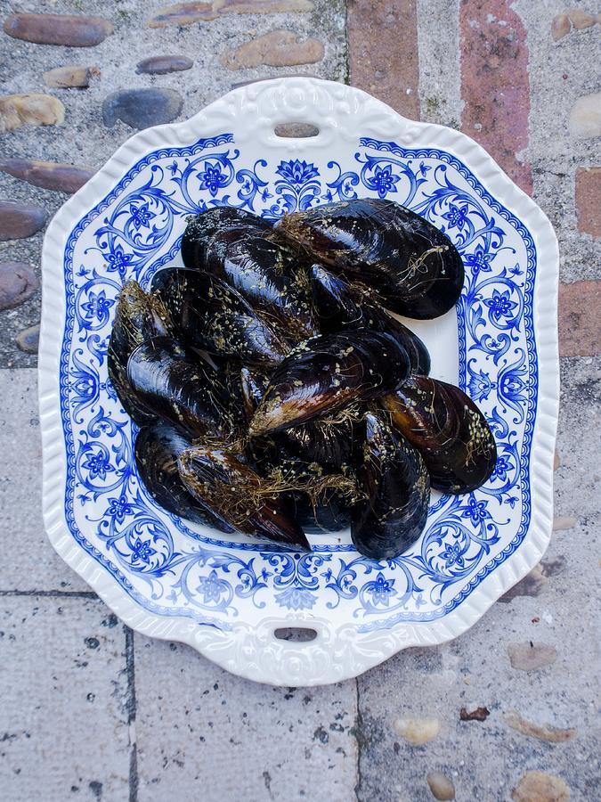 Mussels On A Porcelain Plate Photograph by Miriam Rapado