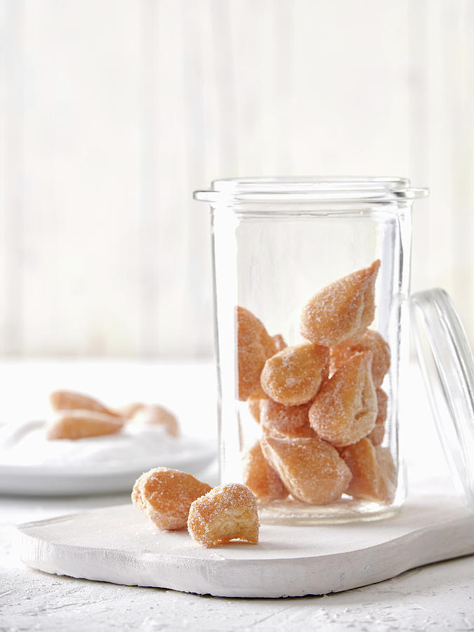 Mutzen Almonds In A Storage Jar Photograph by Sylvia Meyborg