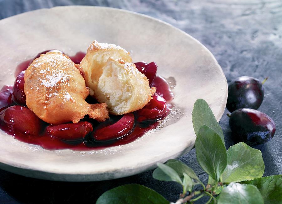 Mutzen karneval Pastry From The Rhineland, Germany In Plum Compote Photograph by Foodfoto Kln
