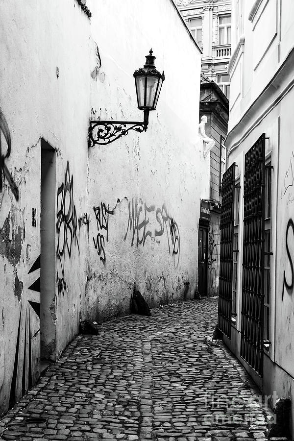 Mysteries in Old Town Prague Photograph by John Rizzuto