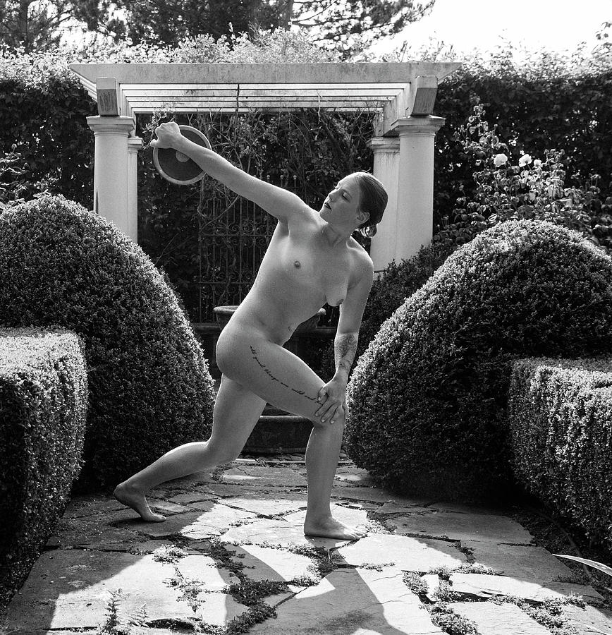 Naked Female Athlete Posing In Garden Photograph by Panoramic Images