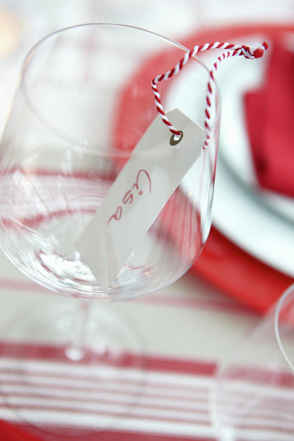Name Tag With Red-and-white Bakers Twin In Wine Glass Photograph by Medri - Szczepaniak