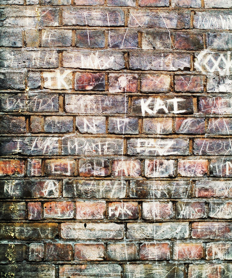 Names On A Brickwall, Handwritten Like Photograph by Marcoventuriniautieri