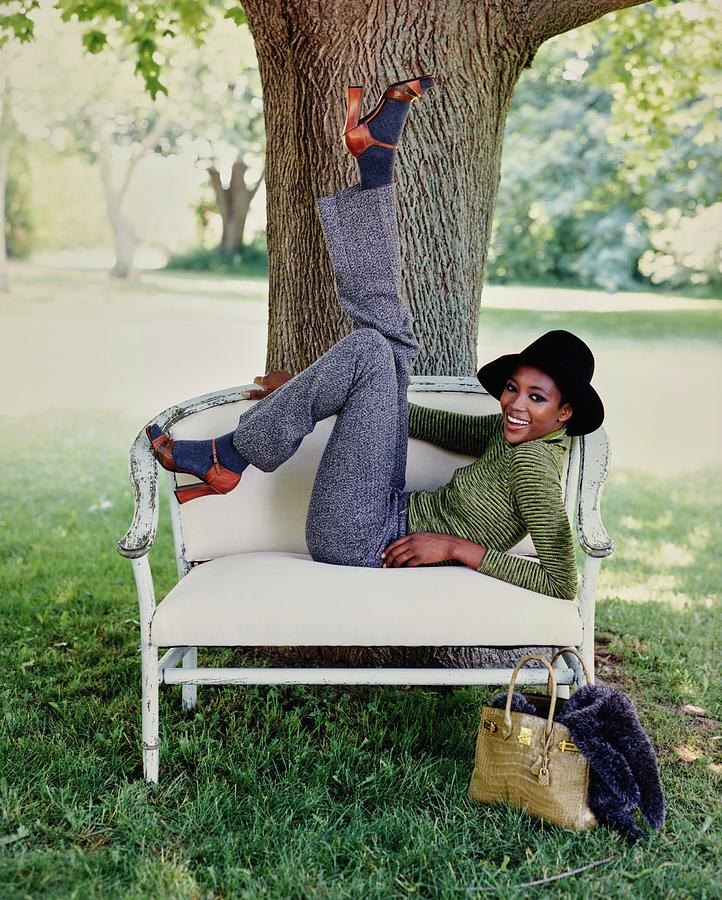 Naomi Campbell On A Park Bench Photograph by Arthur Elgort