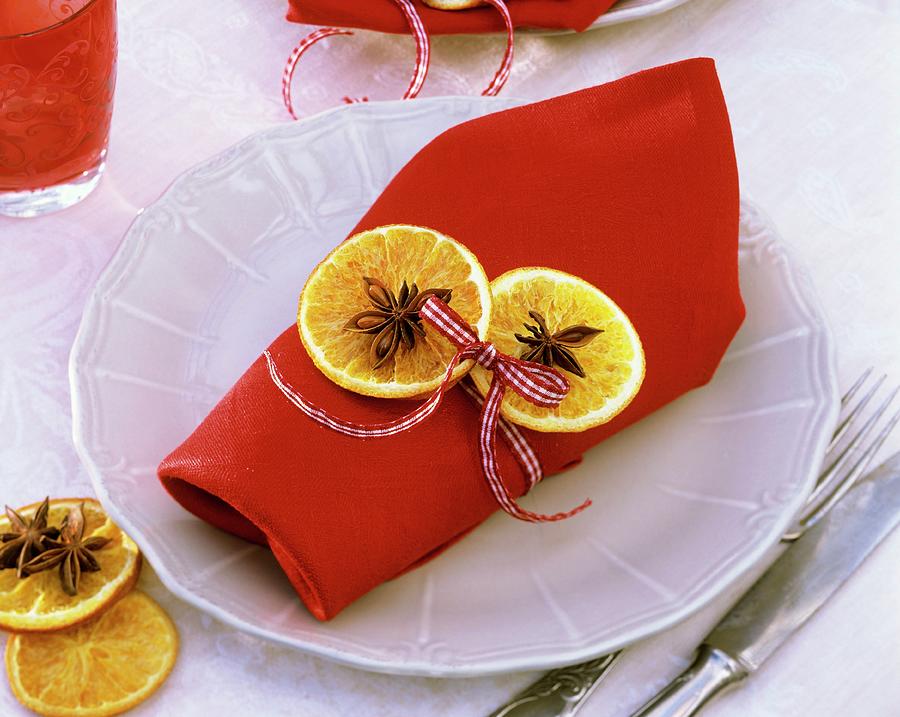 Napkin Decorated With Dried Orange Slices And Star Anise Photograph by Strauss, Friedrich