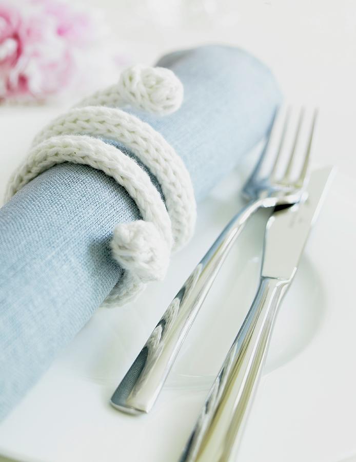 Napkin Wrapped With Cord And Cutlery On Plate Photograph by Jalag / Olaf Szczepaniak