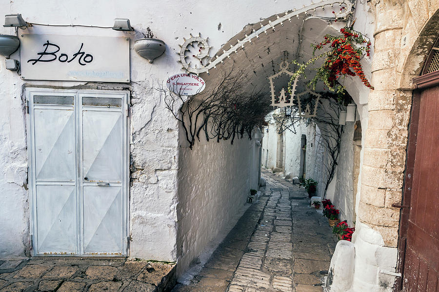 Narrow alley in Ostuni Photograph by Claudio Maioli