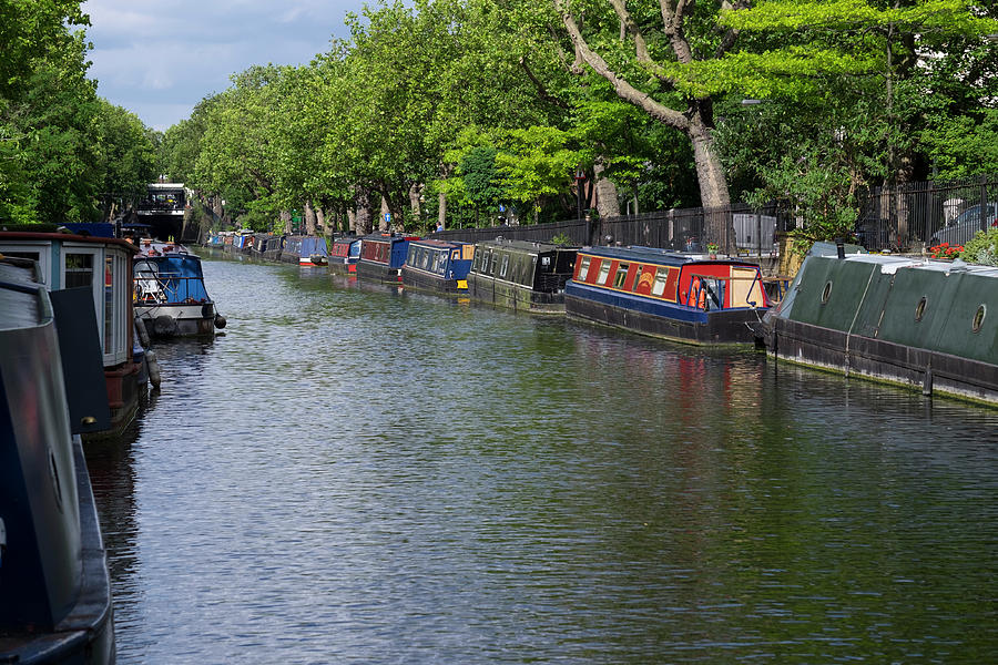 Narrow boats tied to the banks of Regents Canal Photograph by David L Moore