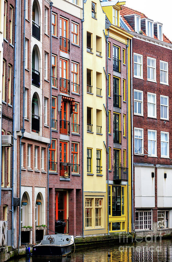 Narrow Houses in Amsterdam Photograph by John Rizzuto