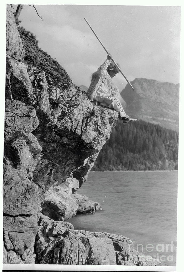 Native American About To Spear Fish Photograph by Bettmann