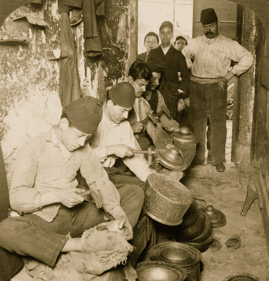 Native metal workers in a primitive factory at Smyrna, Turkey Painting by 