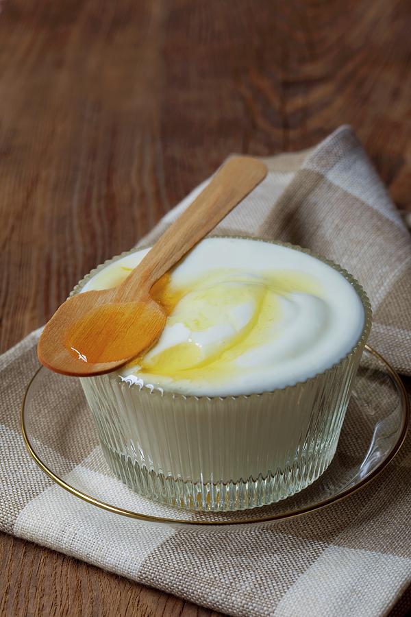Natural Yoghurt With Agave Syrup Photograph by Hilde Mche
