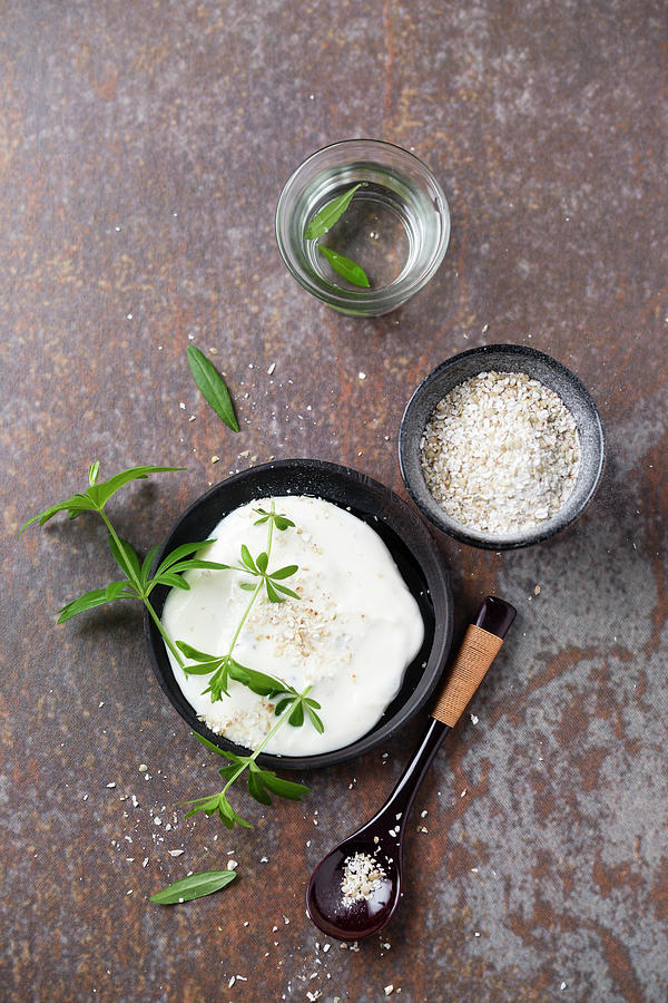 Natural Yoghurt With Woodruff Syrup And Buckwheat Groats Photograph by Mandy Reschke