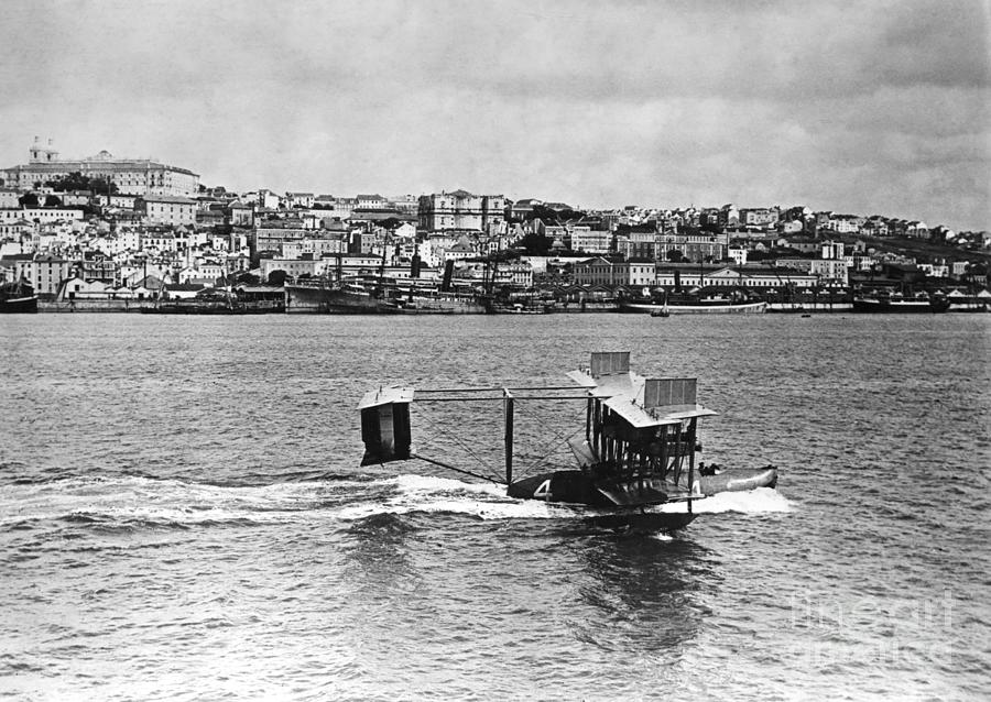 Navy Airplane In Lisbon Harbor Photograph by Bettmann