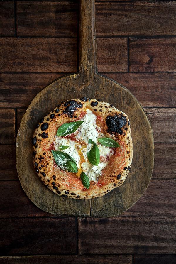 Neapolitan Pizza With Burrata, Olive Oil And Basil seen From Above Photograph by Andre Baranowski