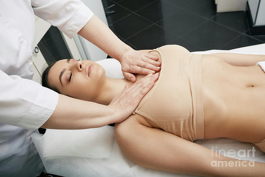 Premium Photo  Young man having neck and shoulders massage in a spa salon