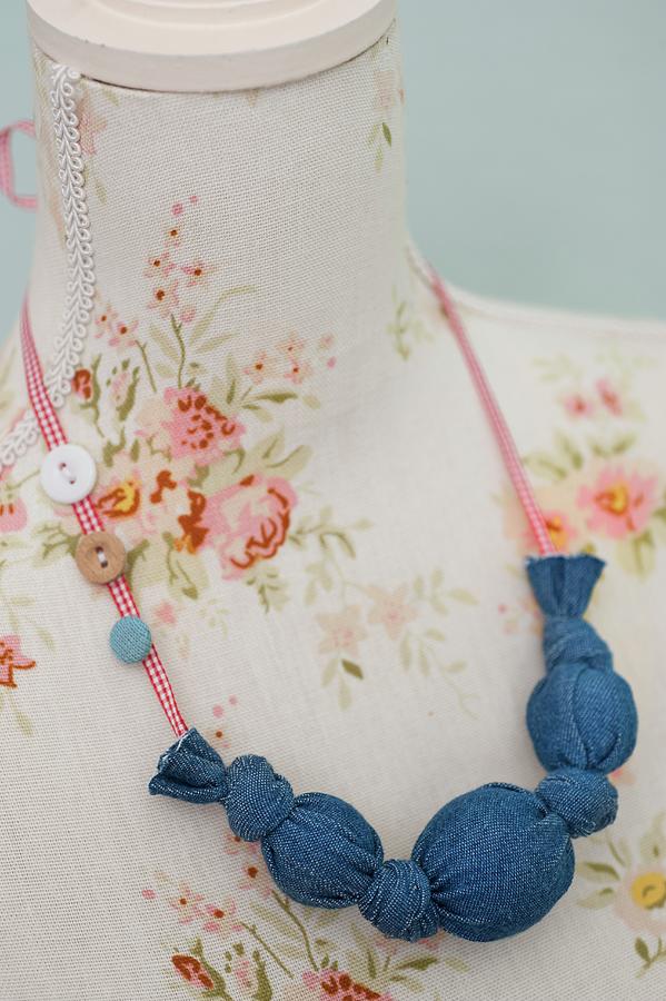 Necklace Made From Denim-covered Beads And Ribbon Photograph by Studio27neun