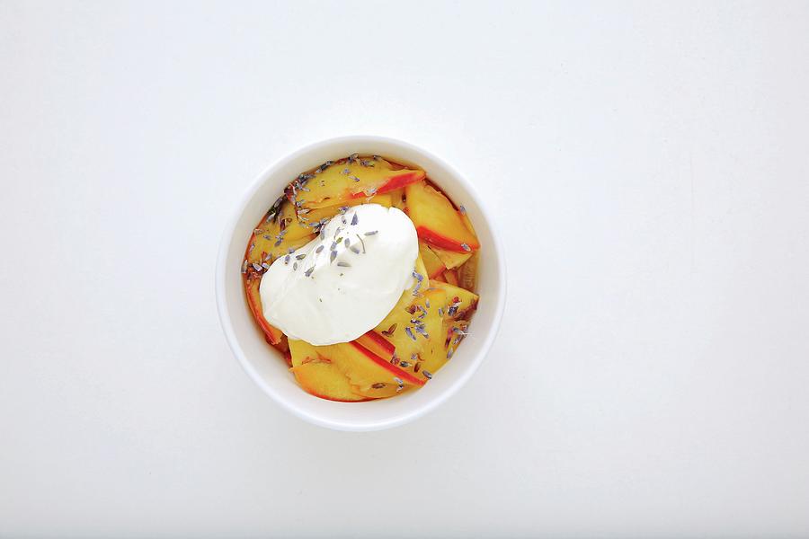Nectarine Compote With Yoghurt And Lavender Photograph by Jalag / Stefan Bleschke
