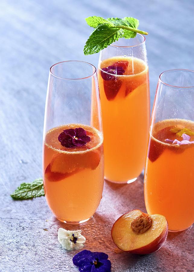 Nectarine Sangria With Flowers And Mint Photograph by Great Stock!