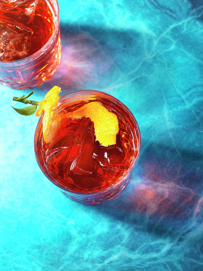 Negroni Cocktails High Angle On Blue Photograph by Flashlight Studio