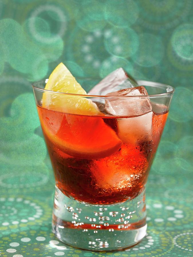Negroni With Ice Cubes Photograph by Kurt Wilson