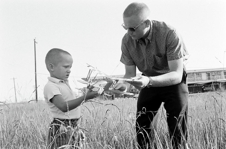 Black And White Photograph - Neil Armstrong Plays With Son by Ralph Morse