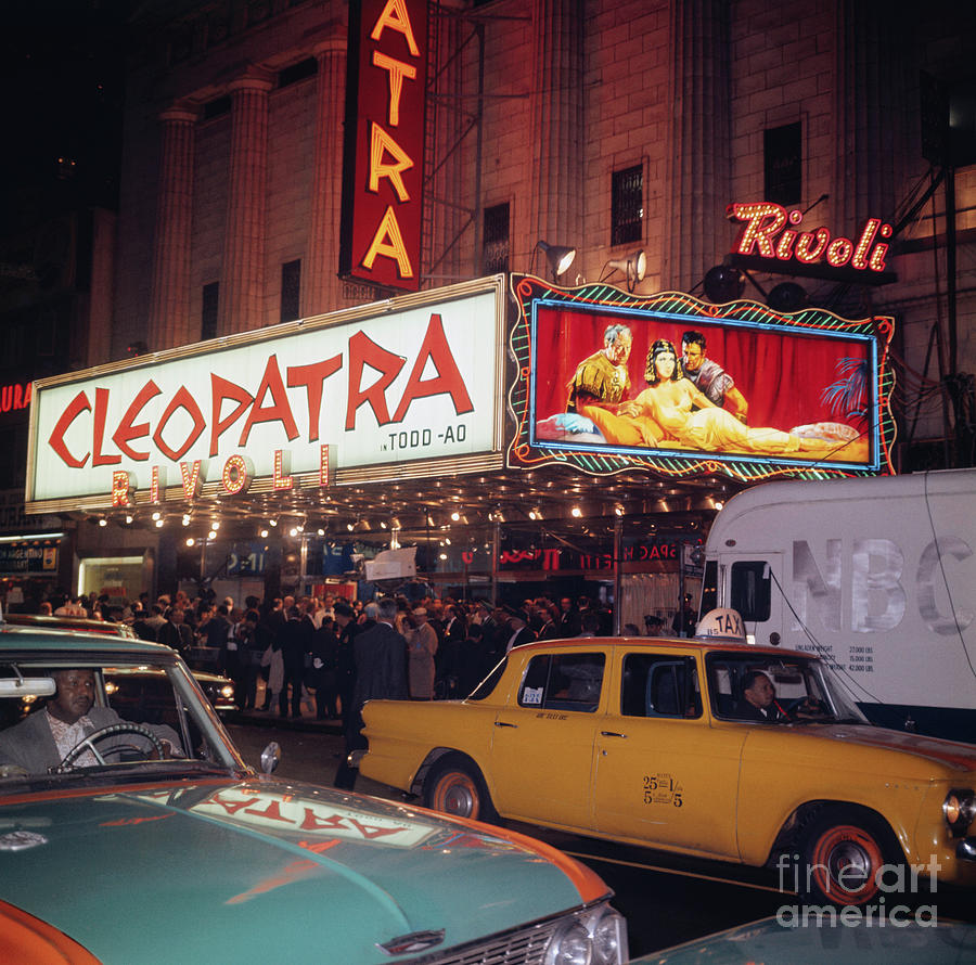 Neon Lit Street With Theater Photograph by Bettmann