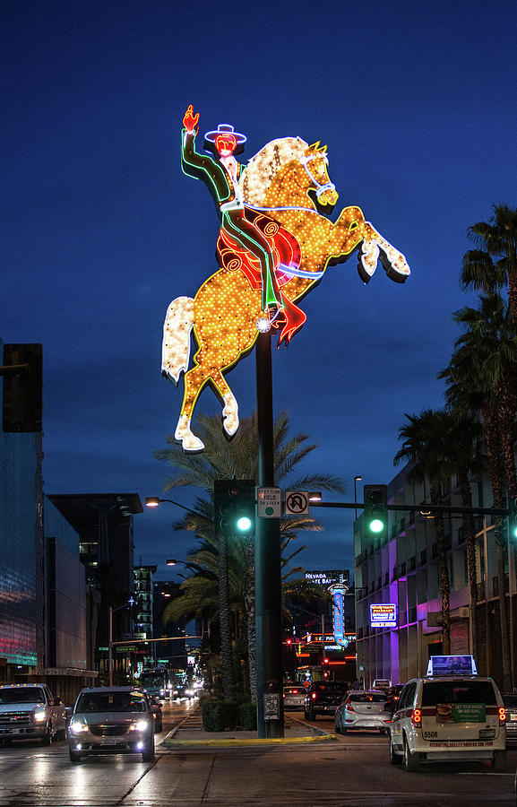Rush Hour Movie Digital Art - Neon Signs In Centre Of Road, Downtown Las Vegas, Nevada, Usa by Tim E White