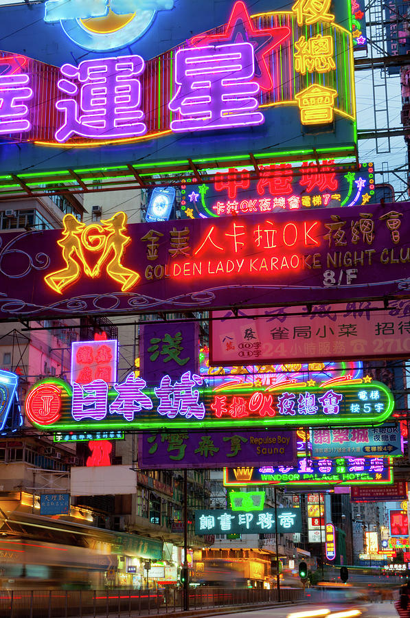 Hong Kong Photograph - Neon Signs On Nathan Road, Kowloon by Tom Bonaventure