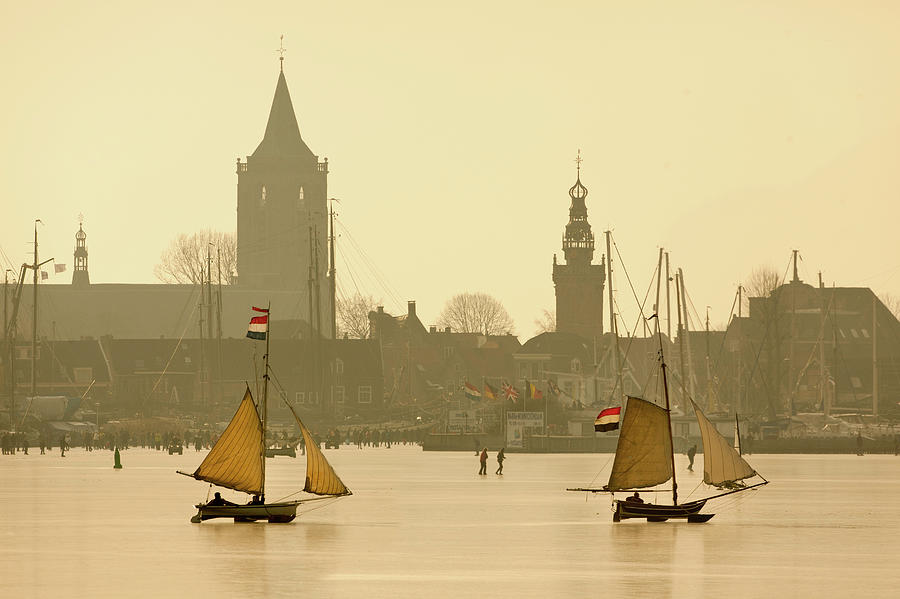 Netherlands, Ice Sailing Boats On Photograph by Frans Lemmens