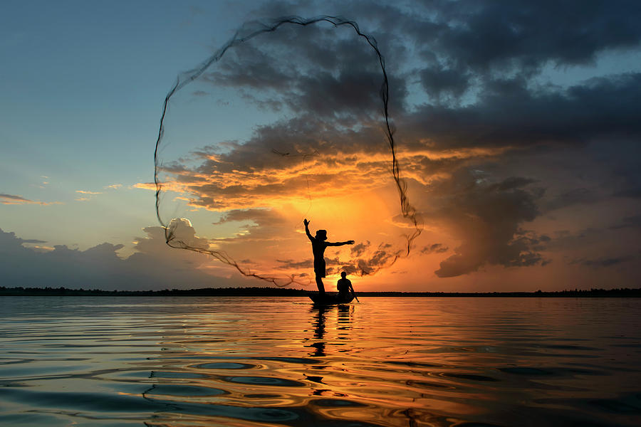 Sunset Photograph - Nets In Sunset by Saravut Whanset
