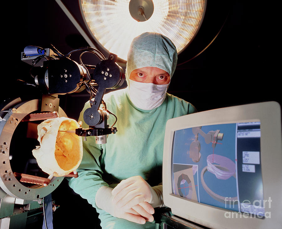 Neurosurgeon With Robot For Brain Surgery Photograph by Klaus Guldbrandsen/science Photo Library