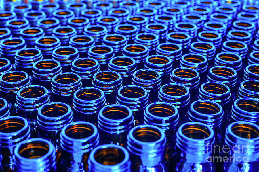 New blue containers for empty medicines, chemical pharmaceutical Photograph by Joaquin Corbalan