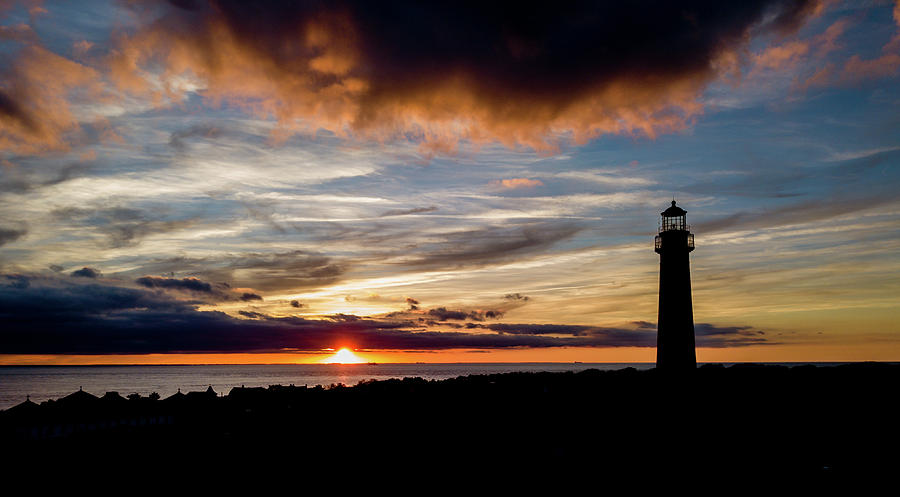 Beach Photograph - New Jerseys Cape May Lighthouse captured at sunset from an aeri by Jorge Moro