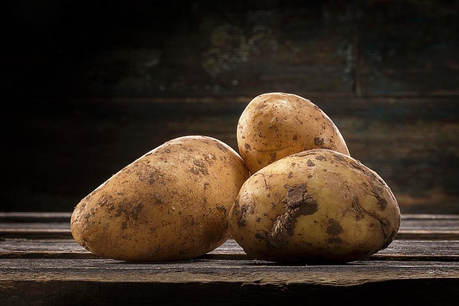 New Potatoes Photograph by Christian Schuster