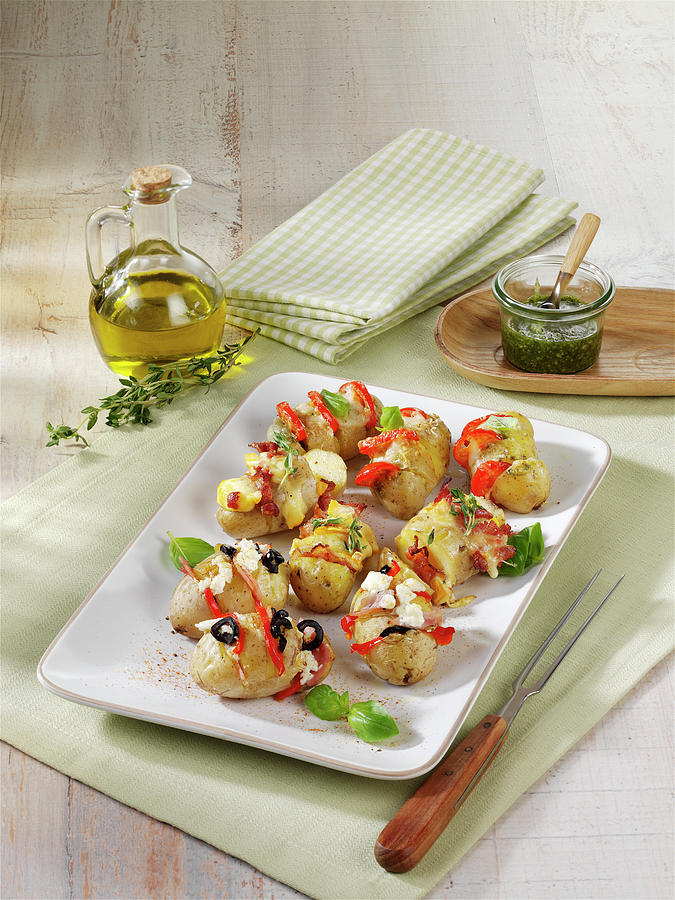New Potatoes Filled With Cheese, Ham And Olives Photograph by Stockfood Studios / Photoart