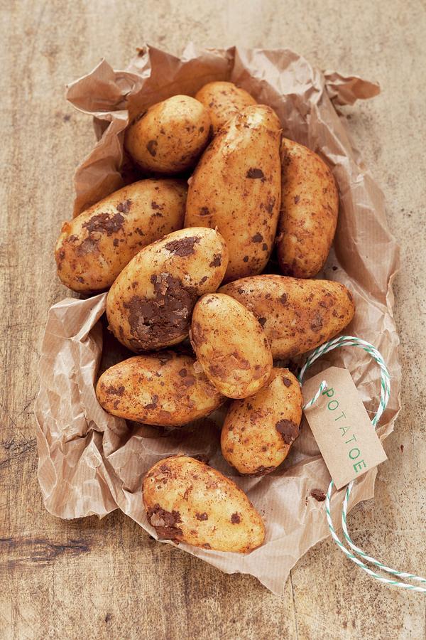 New Potatoes On Brown Paper Photograph by Eising Studio - Food Photo & Video