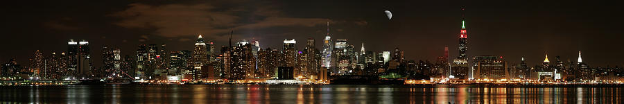 New York City At Night Photograph by Tbabasade